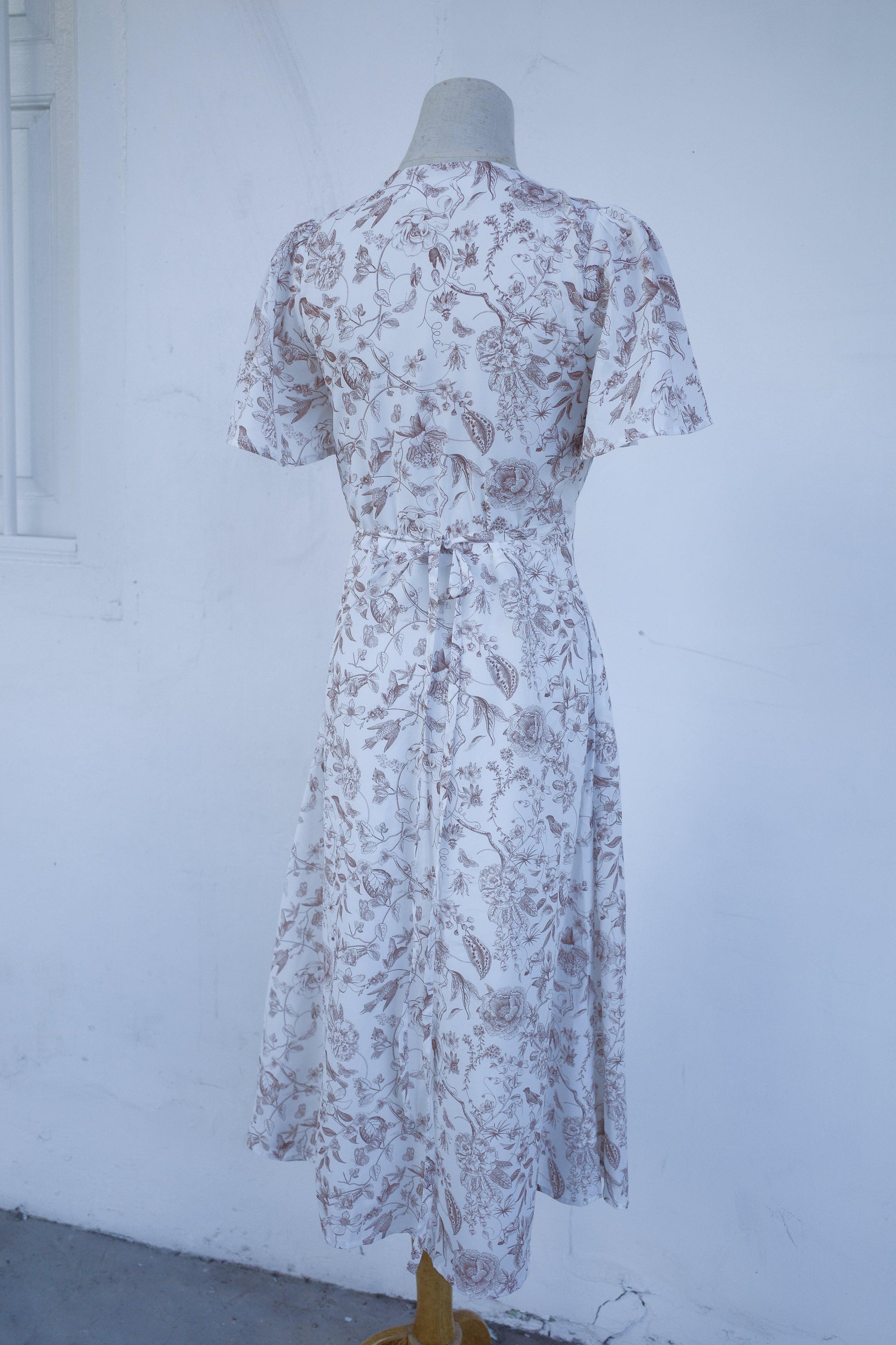 Callie Flutter Sleeve Wrap Dress - TMTSG - www.themadtheories.com